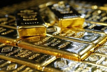 الذهب يتماسك مع تراجع الدولار وانحسار توقعات رفع الفائدة الأمريكية