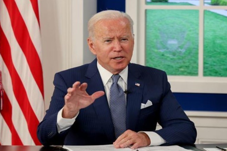 بايدن يدعو روسيا إلى إطلاق سراح مراسل وول ستريت جورنال